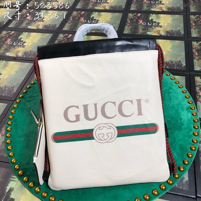 Gucci雙肩包 523586 古馳LOGO印花小號束帶背包 gucci真皮女士後背包  gqy2117