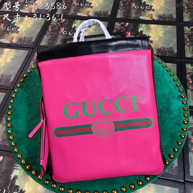 Gucci雙肩包 523586 古馳LOGO印花小號束帶背包 gucci真皮女士後背包  gqy2120